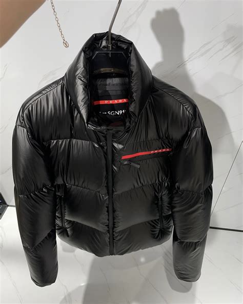 prada down jacket orange|Prada re nylon puffer jacket.